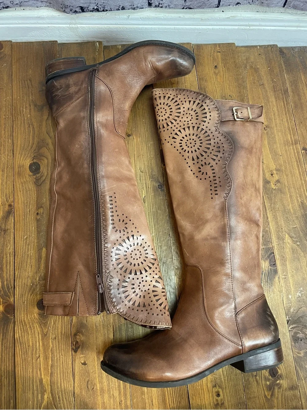 Gianni Bini size 9.5 brown leather riding boots with laser cut design
